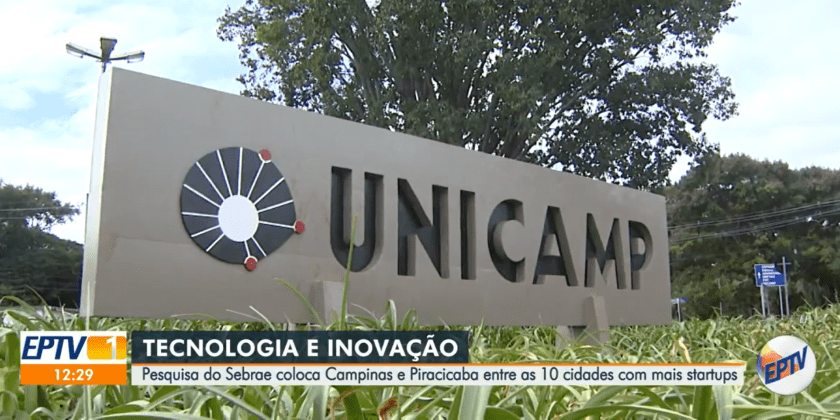 A imagem mostra a fachada e o letreiro da Unicamp, e contém a seguinte legenda: Tecnologia e inovação. Campinas e Piracicaba estão entre as 10 cidades com mais startups em São Paulo. Fim da descrição.